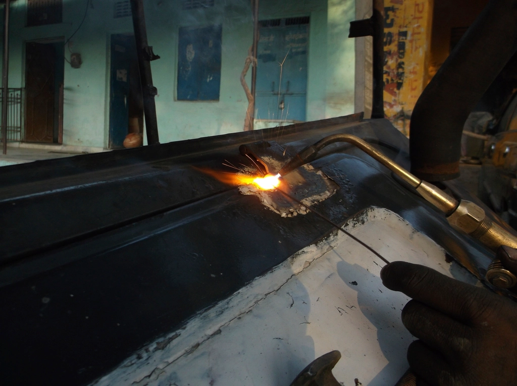 Metal workshop with sparks from welding